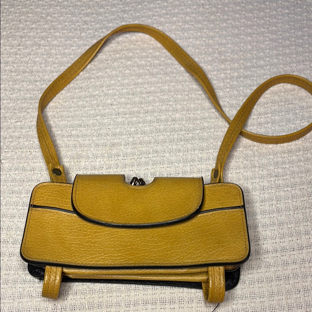 Yellow Crossbody Bag with Structured Design and Curved Flap